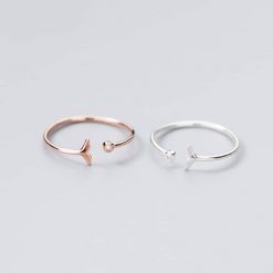 Minimalist whale tail ring